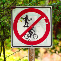 Skateboarding and biking prohibited sign in Minoru Park (Richmond, BC)