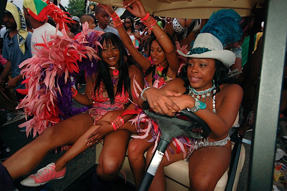 Toronto Caribana 2010 — dance sitting in golf car