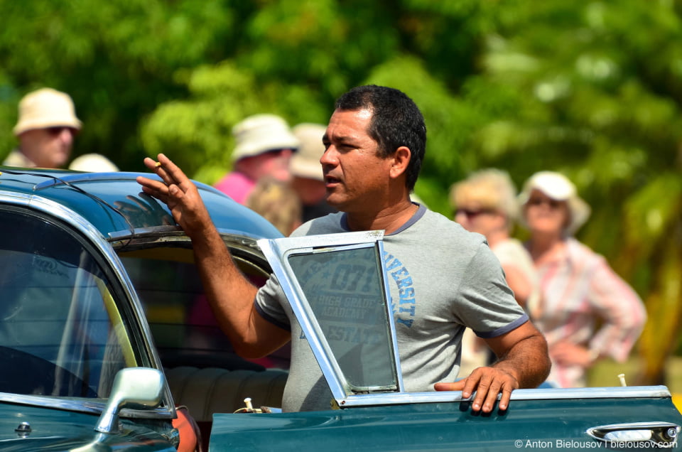 Cuban vintage taxi driver