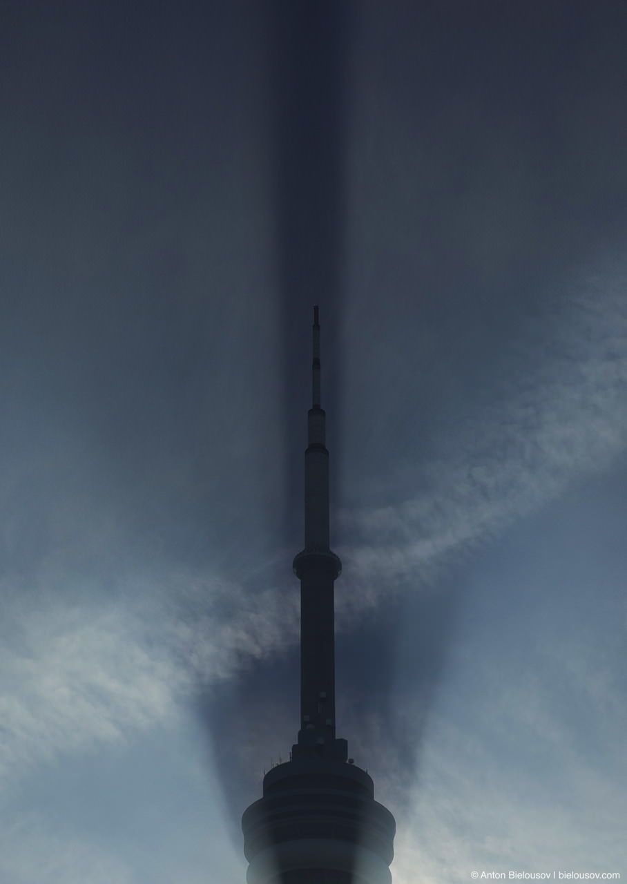 CN Tower throughs a long sahdow early morning