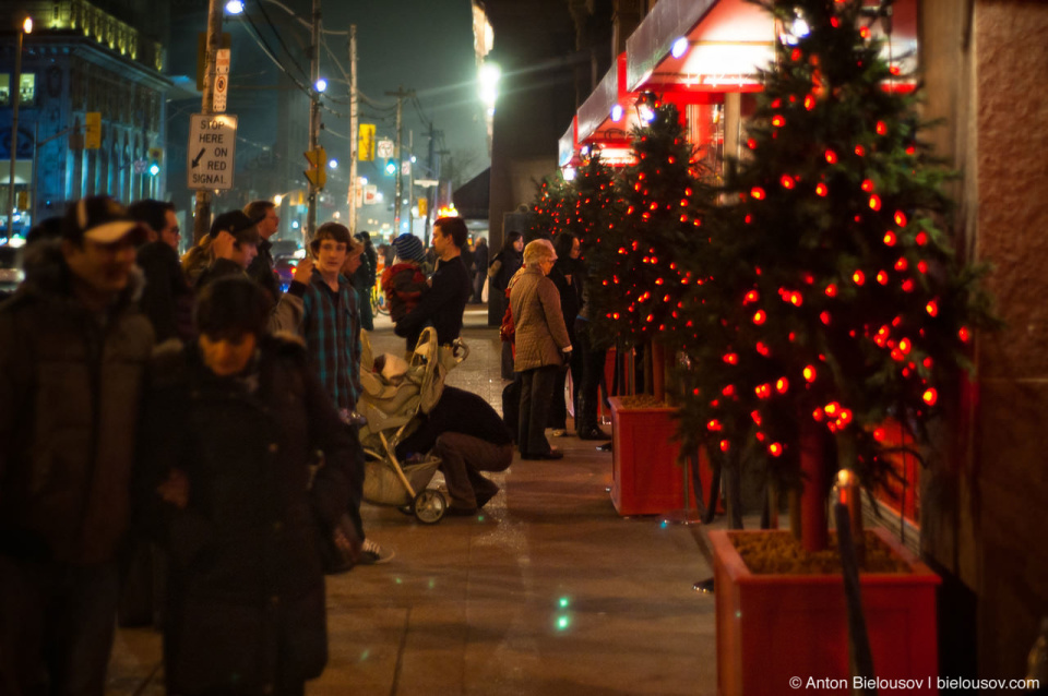 First christmas decorations in the fog on Toronto streets