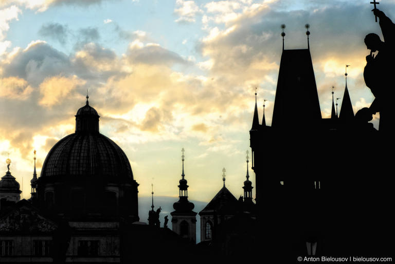 Prague Roofs silhouettes from Charles Bridge in the morning