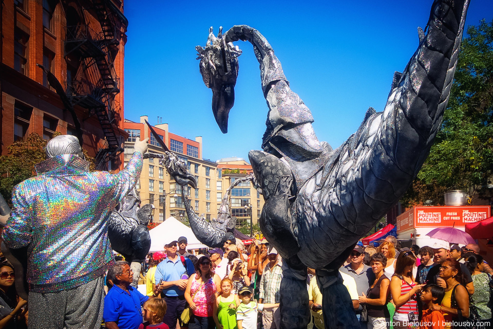 Walking dinosaurs at Toronto Buskerfest, 2010 — Front St. / Church St. (Flatiron building on the left.)