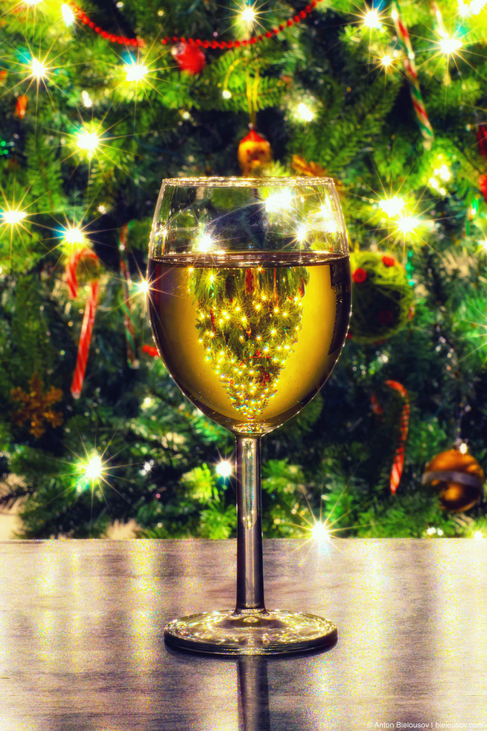 Christmas tree whirlpool in a glass of wine