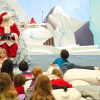 Santa Claus Reading about Charlie Brown at Toronto Eaton's Cente Santa Claus Reading about Charlie Brown at Toronto Eaton's Cente