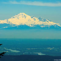 Baker Mountain in Washington, USA as seen from Grouse Mountain in Vancouver, BC Baker Mountain in Washington, USA as seen from Grouse Mountain in Vancouver, BC