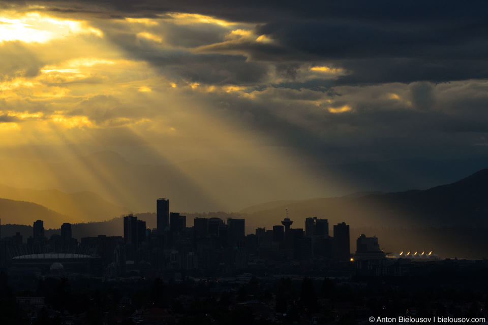 Vancouver in rays of evening sun as seen from Burnaby Centre