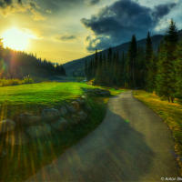 Sun Peaks sunset over golf course field (HDR) Sun Peaks sunset over golf course field (HDR)