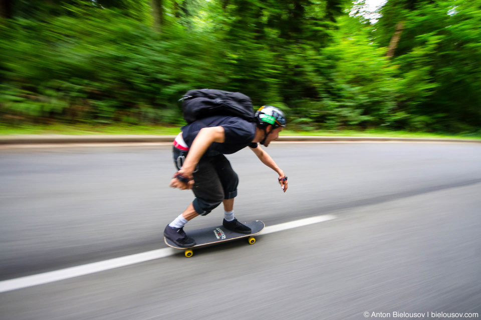 Downhill skateborader at Critical Mass in Vancouver, BC